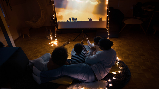 family bonding watching movie using projector