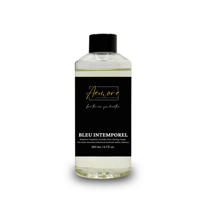 Bottle of 'Aémore Diffuser Oil Refill Bleu Intemporel' with black label on a white background