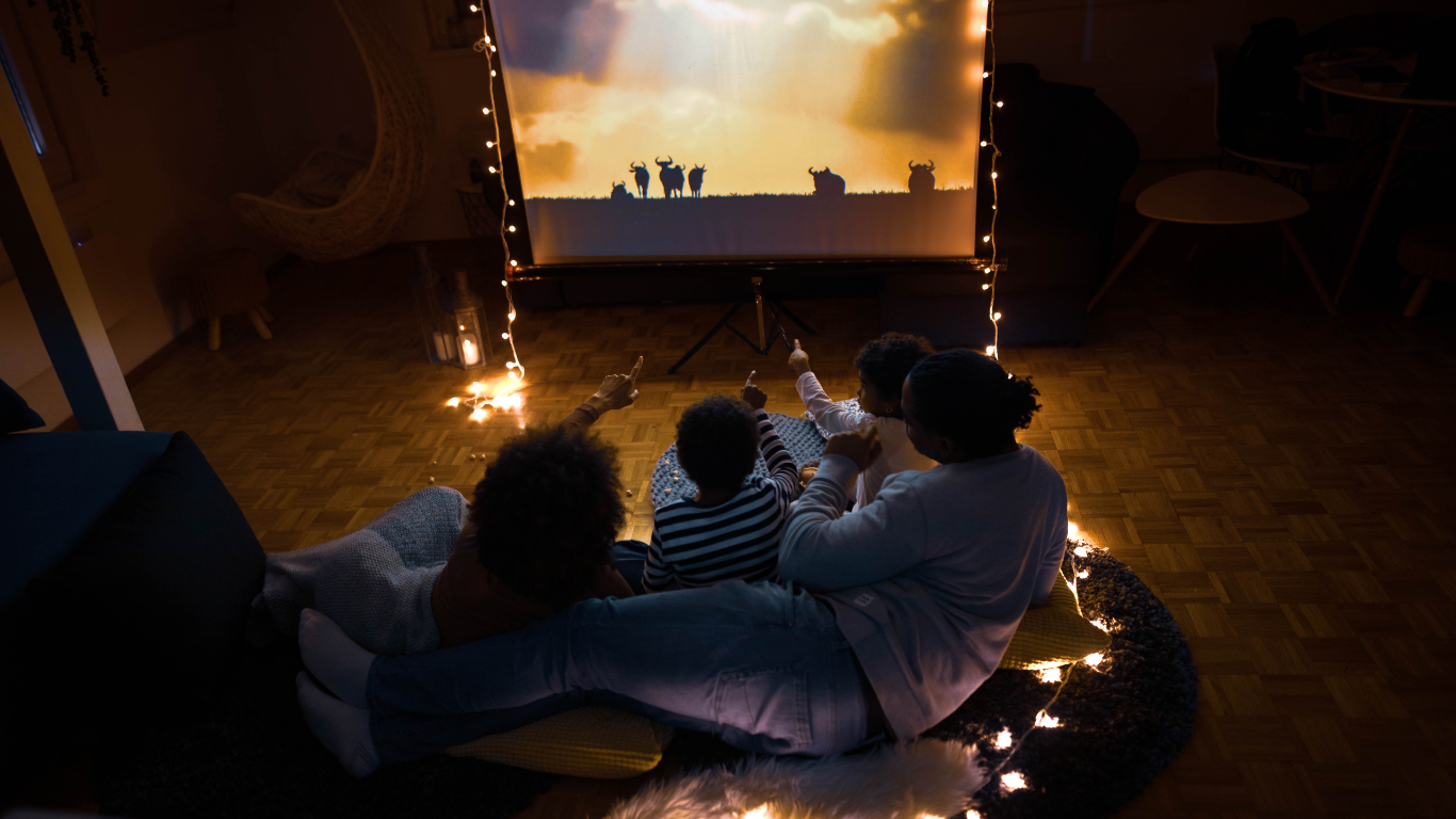 family bonding watching movie using projector