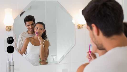 happy couple brushing their teeth