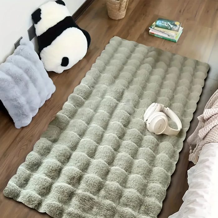 Green faux fur bubble rug with headphones and a panda pillow