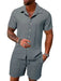 Man in a grey textured short sleeve shirt and shorts set