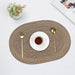 Coffee oval braided placemat with a cup and cutlery