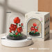 Red rose bouquet in a dome, about 8.5 x 8.5 x 10.6 cm, beside its colour box