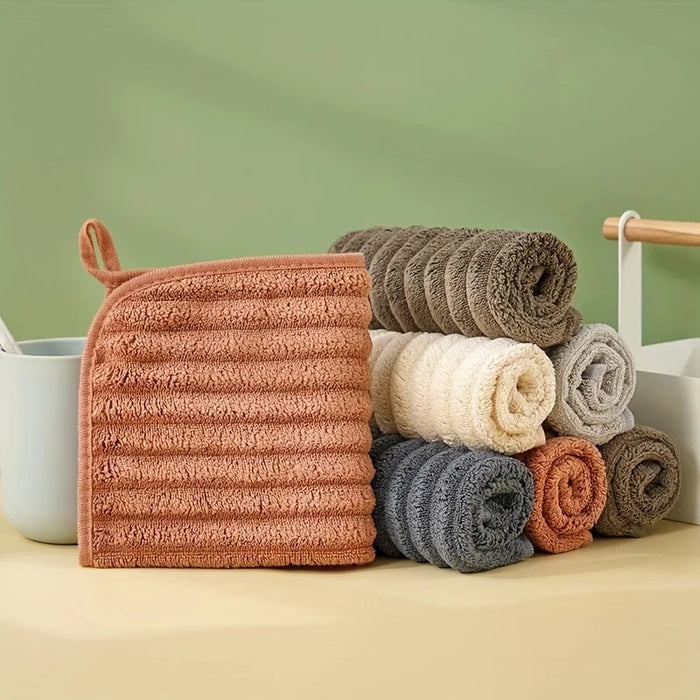 Rolled ribbed hand towels in rust, brown, beige, grey and navy