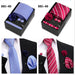 Four men's tie gift sets in assorted patterns with style codes