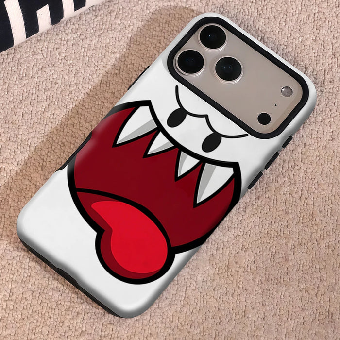 White cartoon ghost face phone case lying on fabric