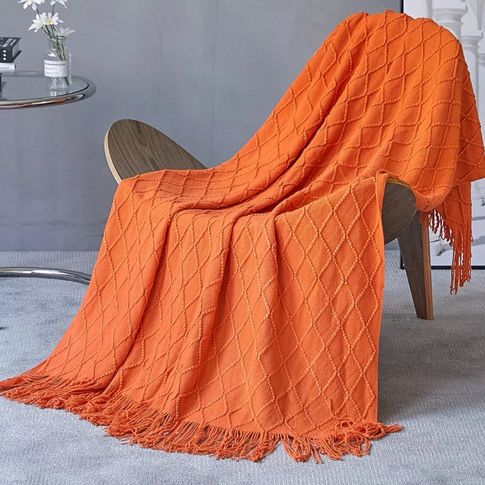 Orange diamond knit throw on a chair