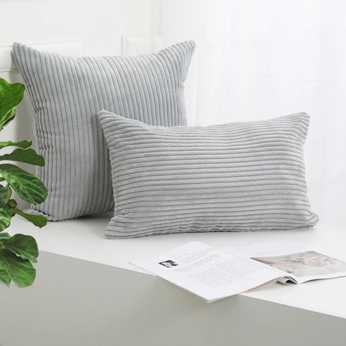 Light grey corduroy cushions, square and rectangular
