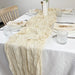 Cream gauze table runner on a dinner table