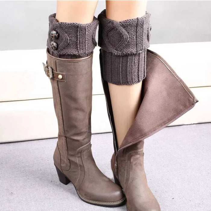 Grey knit boot cuff over a tall brown boot