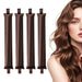 Four coffee-brown satin curling rods beside a woman with wavy hair