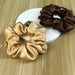 Gold and brown silk scrunchies