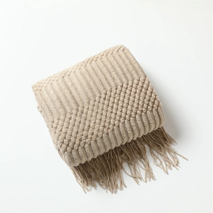 Folded khaki bubble knit throw