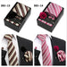 Four men's tie gift sets in assorted patterns with style codes