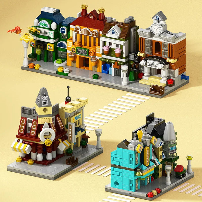 Mini street shop models including a bookshop, café and clock tower