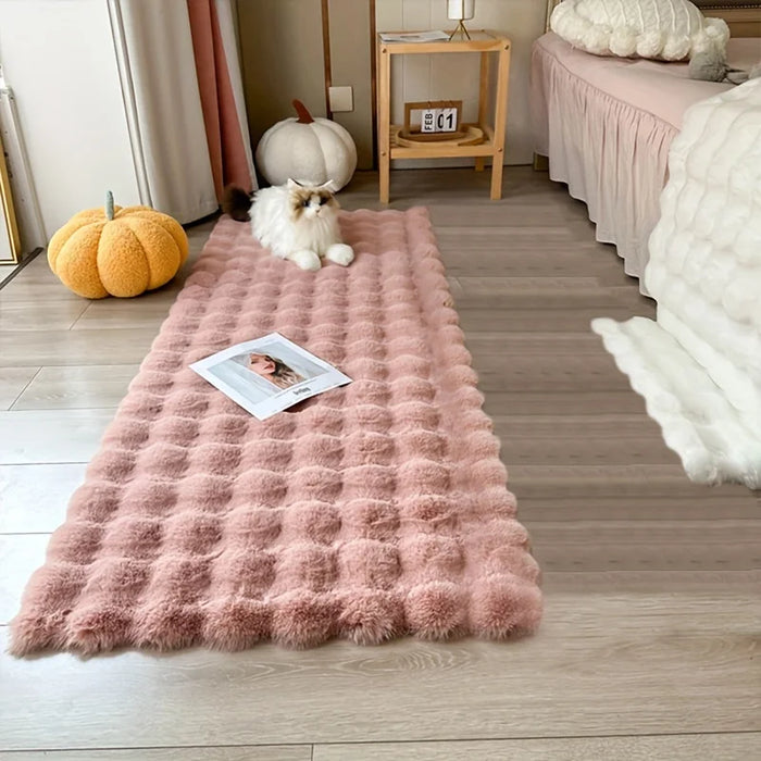 Pink bubble rug in a bedroom with pumpkins