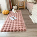Pink bubble rug in a bedroom with pumpkins