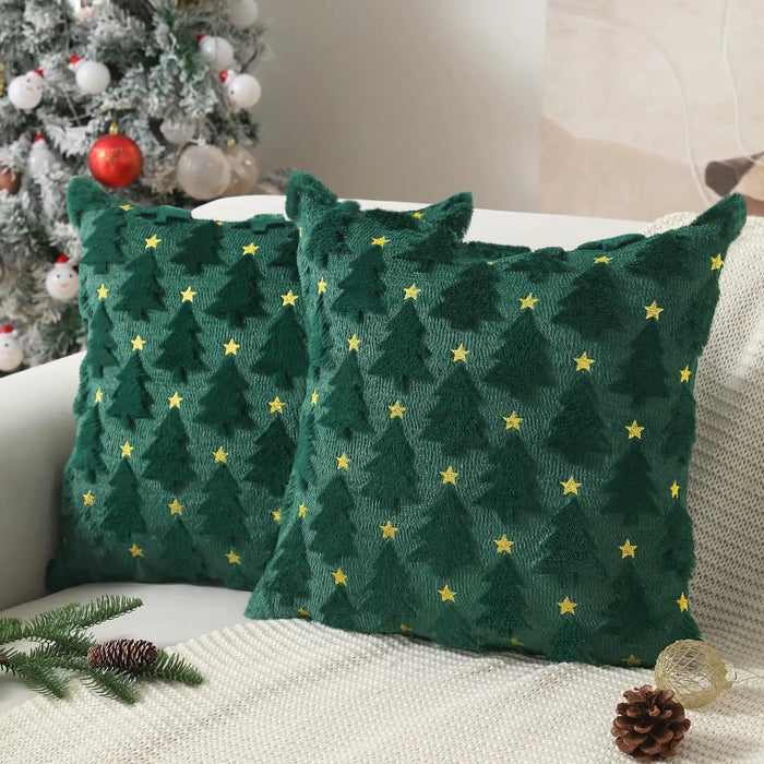 Two green tree cushion covers with gold stars