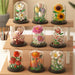 Nine micro building block flower bouquets in clear domes on wooden shelves