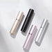 Gold, black, pink and silver perfume atomizers