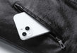 Phone in the zip side pocket