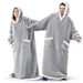 Two people in grey long blanket hoodies