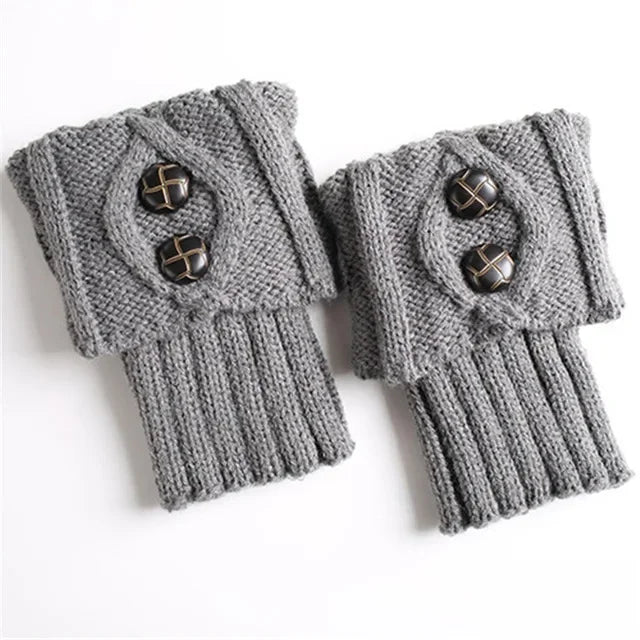 Pair of light grey knit leg warmers with two buttons