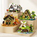 Four mini cabin building block sets on a display stand