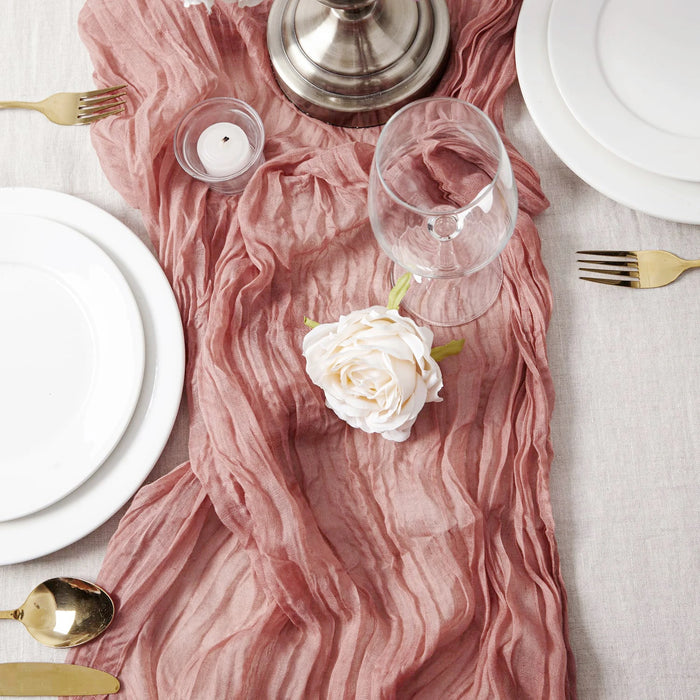 Bean pink gauze runner with candles and a rose