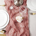 Bean pink gauze runner with candles and a rose