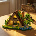 A-frame forest cabin building block set with a 579 pieces sign