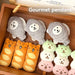 Box of food plush charms: fish cake puppies, bread bears and dango puppies