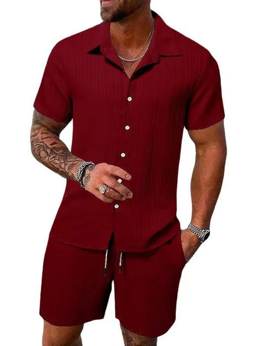Man in a wine red short sleeve shirt and shorts set