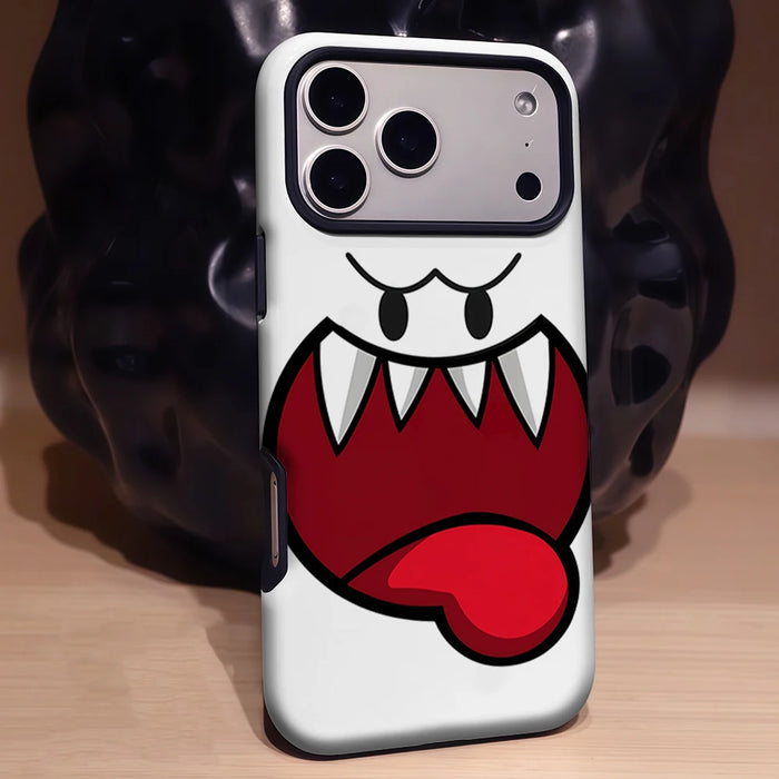 White cartoon ghost face phone case standing on a table