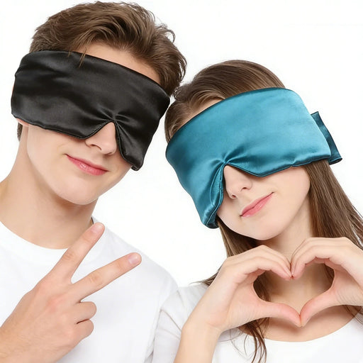Man and woman wearing black and blue sleep masks