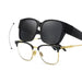 Fit-over sunglasses shown above a pair of gold-frame prescription glasses