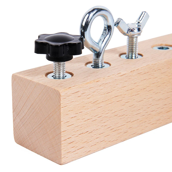 Close-up of the knob screw, eye bolt and wing screw in the wooden board