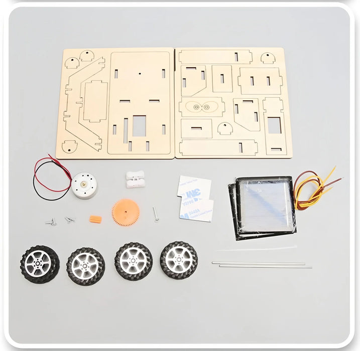 Lunar rover kit parts: wooden sheets, solar panel, motor and wheels