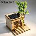 Solar hut wooden model with a palm tree