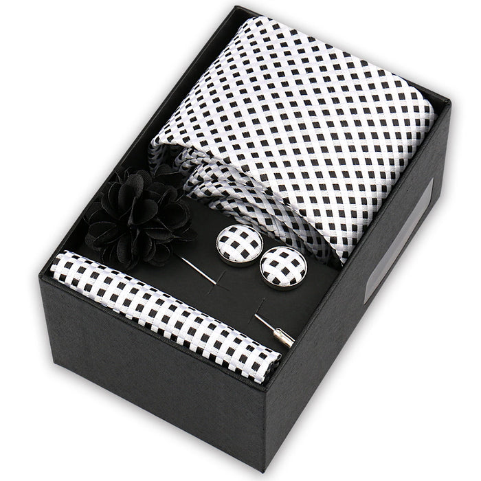 Men's tie gift set in a black box: black and white check tie, pocket square, cufflinks and lapel flower pin