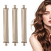 Three champagne satin curling rods beside a woman with wavy hair