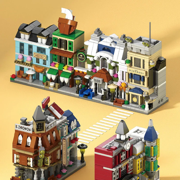 Row of mini street shop models with cafés, a bakery and a hotel