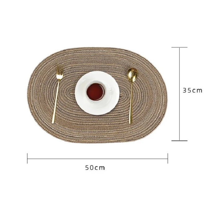Oval placemat measuring 35 x 50 cm with a plate and cutlery
