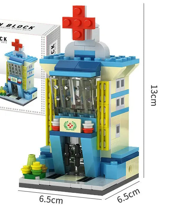 Blue hospital building block model with red cross, 13 cm tall
