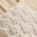 Close-up of the white raised tree pattern