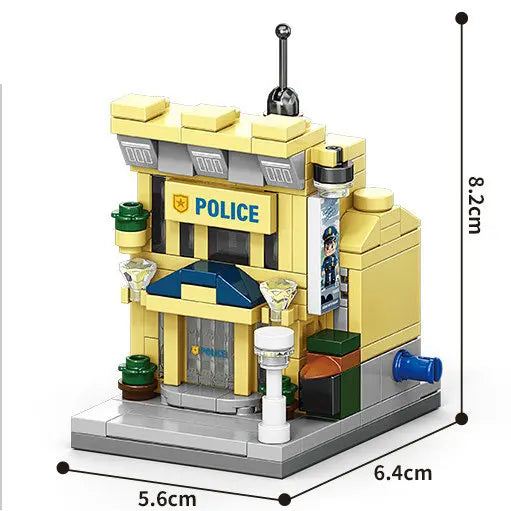 Yellow police station building block model, 8.2 cm tall