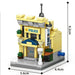 Yellow police station building block model, 8.2 cm tall