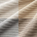 Close-up of grey and beige ribbed corduroy