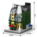Green store building block model with bottle tower, 7 cm tall